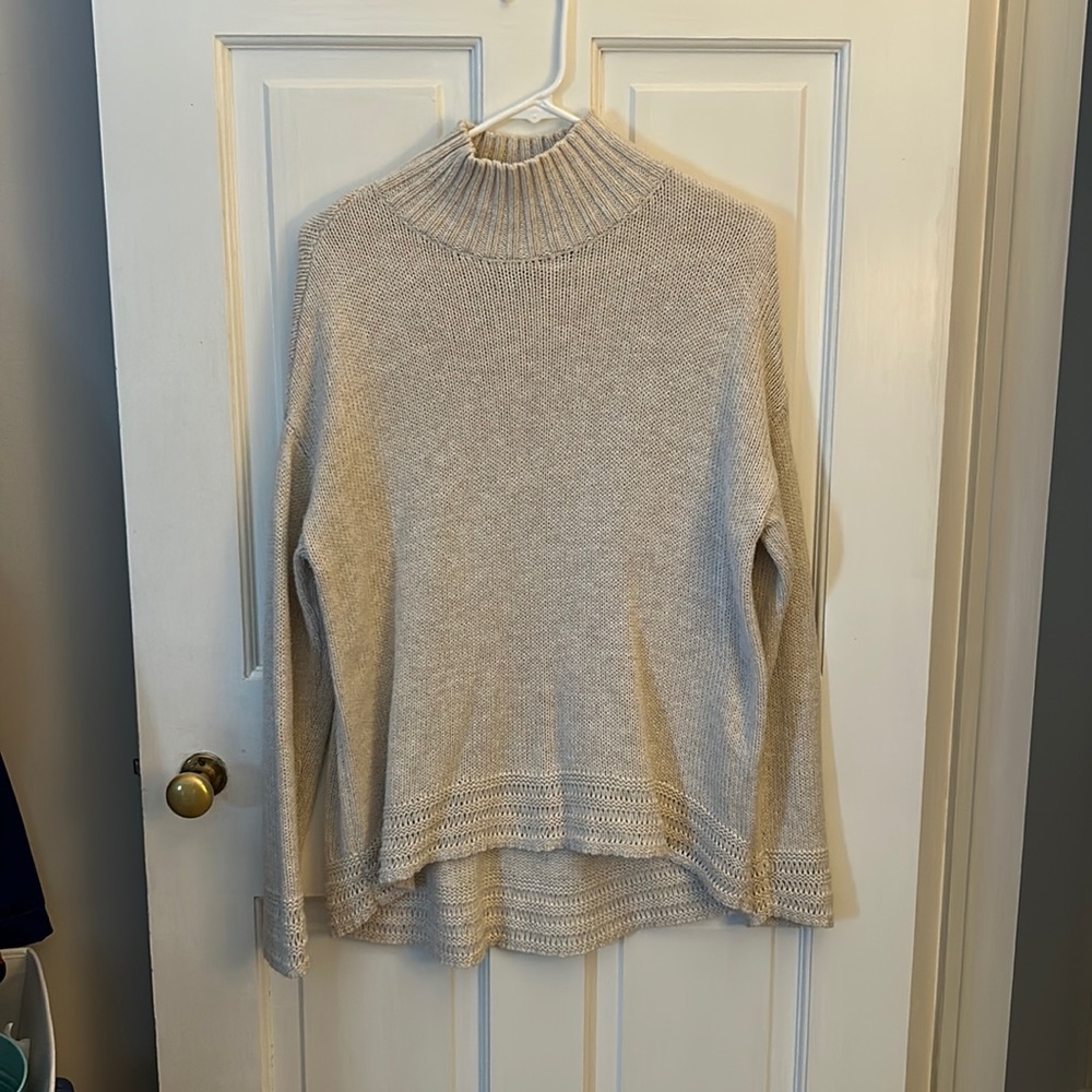 Old Navy turtleneck sweater. Size Small. Crochet detail on sleeves and bottom.